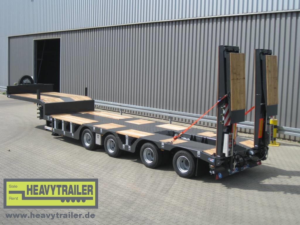 HRD 4 axle low-bed trailer with wheel recess, excavator pit and hydraulic ramps