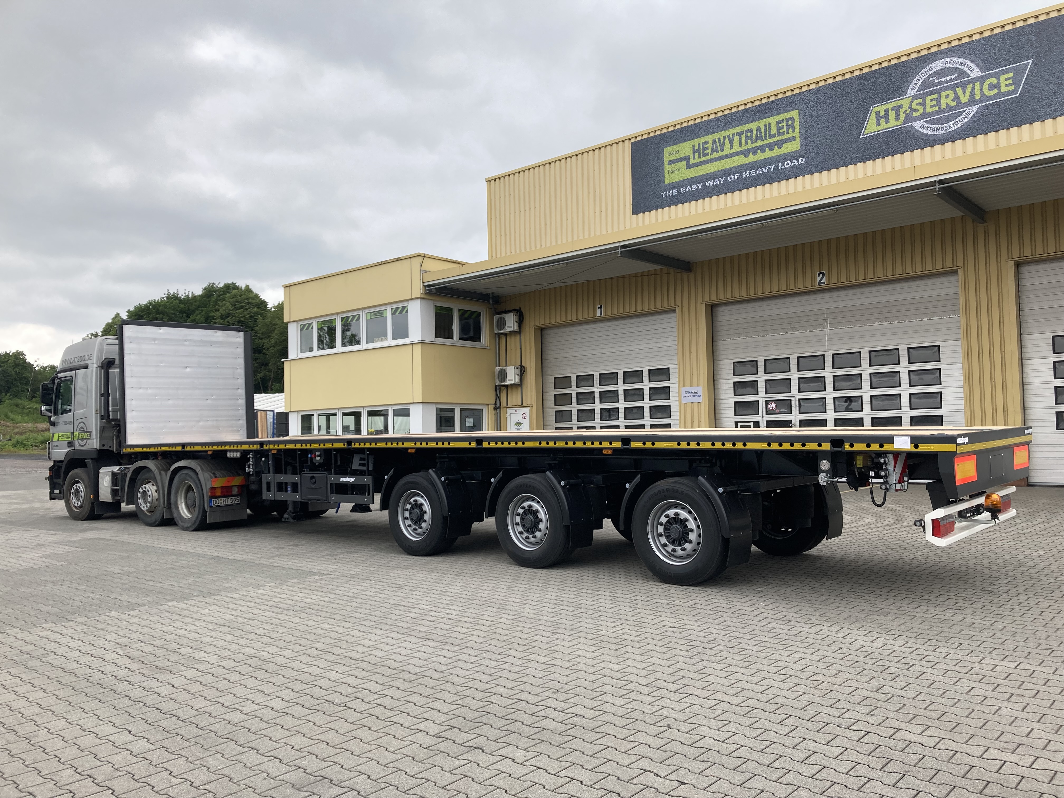 Meusburger 3-axle-tele-plateau-trailer