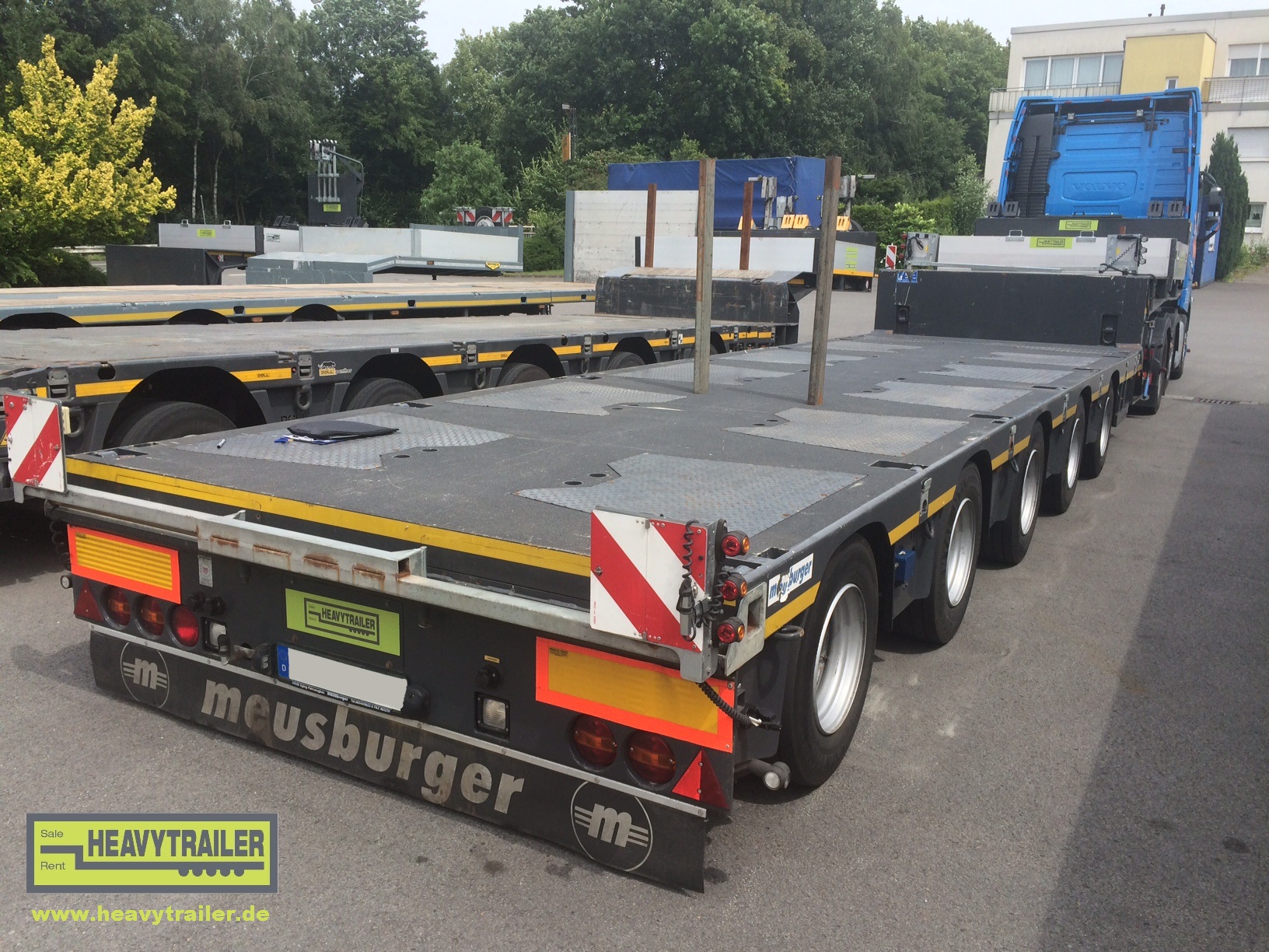 Meusburger 5-axle-semi-trailer with hydraulic ramps