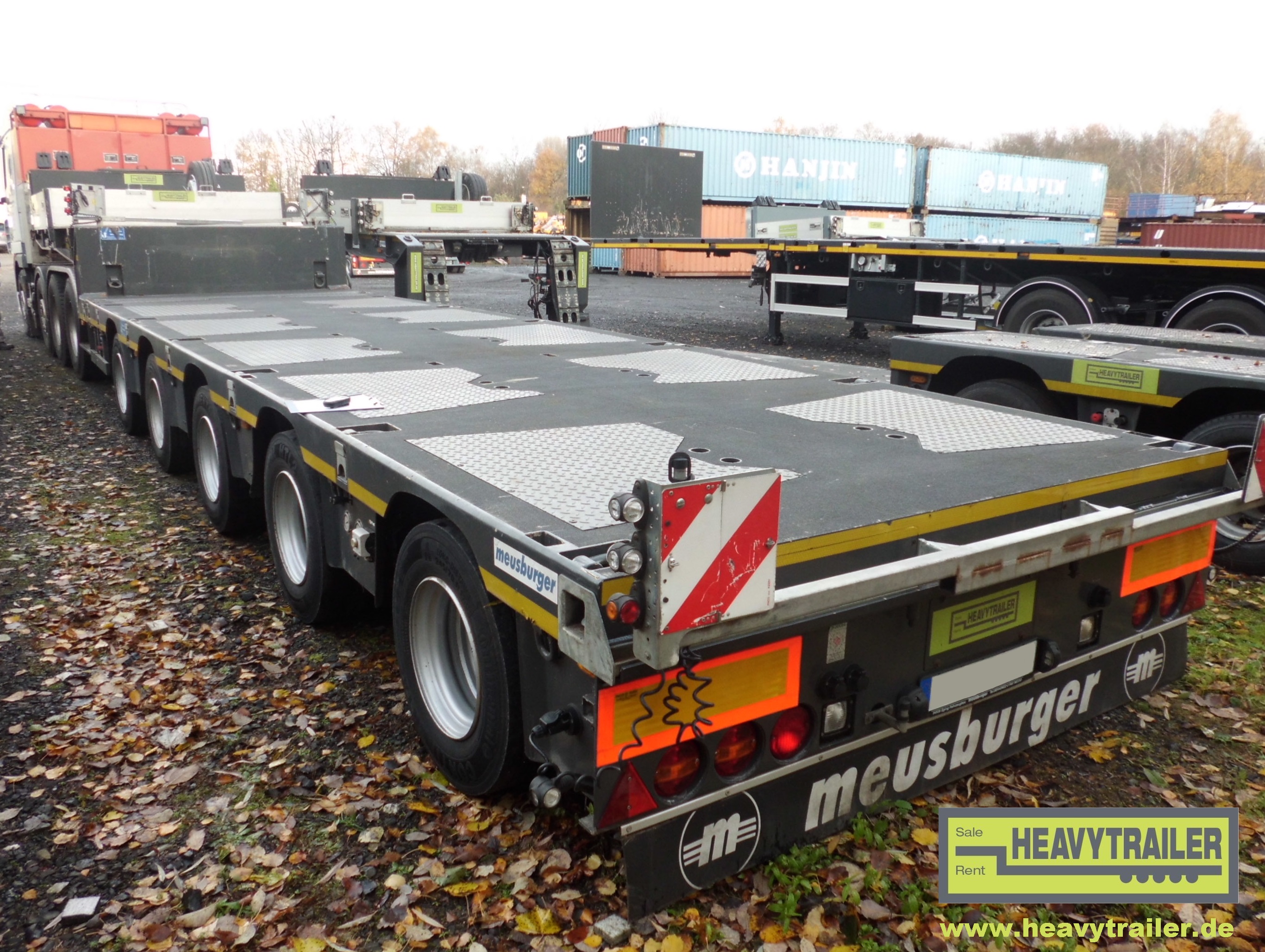 Meusburger 5-axle-semi-trailer with hydraulic ramps