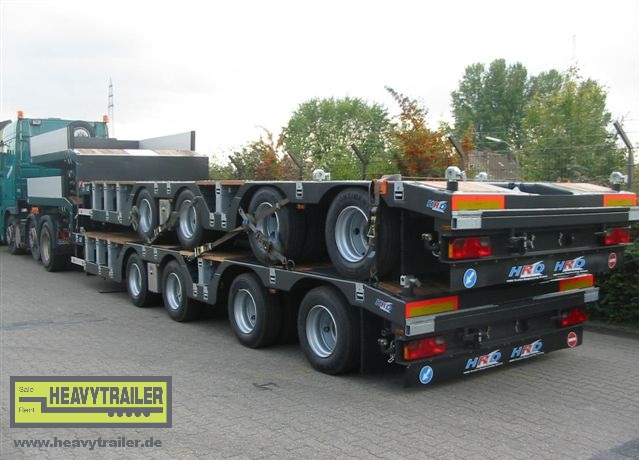 HRD 4-axle low bed trailer with wheel recess and extravator pit 