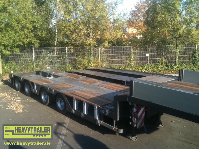 HRD 4-axle low bed trailer with wheel recess and extravator pit 