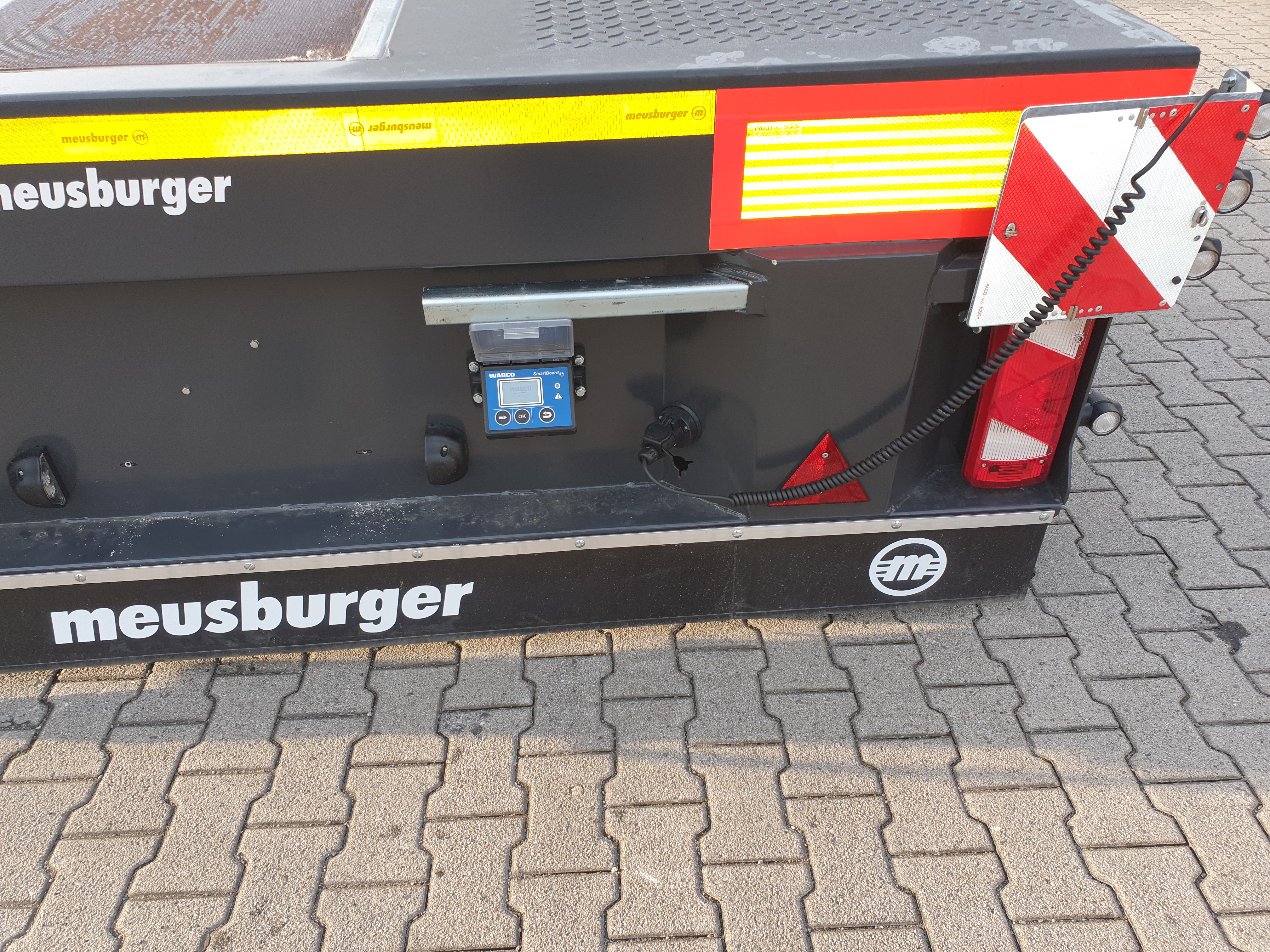 Meusburger 1-axle low deck trailer